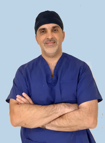 Photo of Mr Dan Arvinte dressed in blue theatre scrubs.